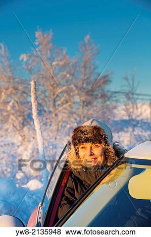 Female taking in the view of frozen landscape. Extreme cold temperatures. Lapland, Sweden. View Large Photo Image Stock Photo - Female taking in the view of frozen landscape. Extreme cold temperatures. Lapland, Sweden.. Fotosearch