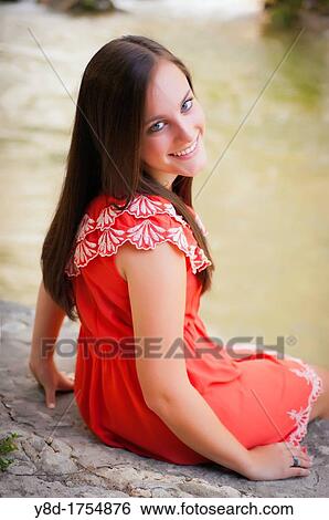 Female Teenager, 17 years old, caucasian, sitting next to the Frio River in Concan, Texas, USA View Large Photo Image Stock Photograph - Female Teenager, 17 years old, caucasian, sitting next to the Frio River in Concan, Texas, USA. Fotosearch