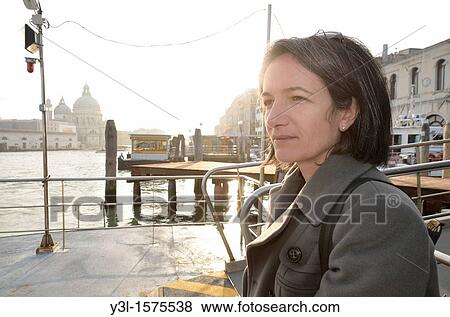 Female tourist 46 in Venice by Santa Maria della Salute church and canal, Venice, Italy View Large Photo Image Stock Photo - Female tourist 46 in Venice by Santa Maria della Salute church and canal, Venice, Italy. Fotosearch