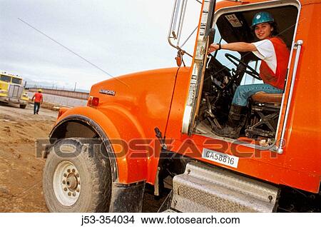 Female truck driver. I-880 Cypress project. Oakland, California. USA. View Large Photo Image Picture - Female truck driver. I-880 Cypress project. Oakland, California. USA.. Fotosearch