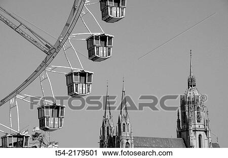 Ferris wheel infront St. Paul Church in Munich View Large Photo Image Stock Image - Ferris wheel infront St. Paul Church in Munich. Fotosearch