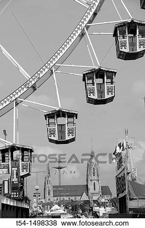 Ferris wheel infront St. Peters Church in Munich View Large Photo Image Stock Photo - Ferris wheel infront St. Peters Church in Munich. Fotosearch