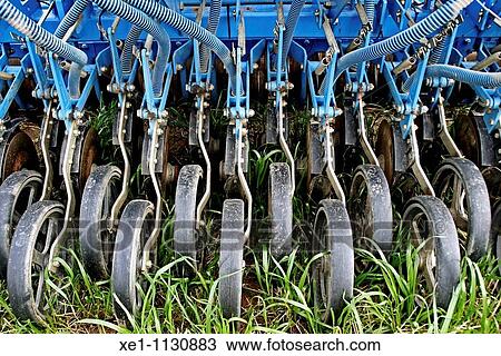 Stock Image - fertilizer's wheels, agricultural machinery.. Fotosearch