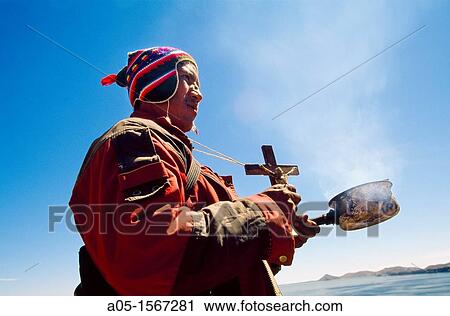 Stock Image - Festival of the Virgin of Copacabana (5 and 6 August), offerings to Pachamama in Mount Calvario, Copacabana, La Paz Department, Bolivia. Fotosearch