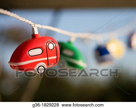 Festive lights shaped like travel trailers hang in Santa Barbara, California, United States View Large Photo Image Stock Photo - Festive lights shaped like travel trailers hang in Santa Barbara, California, United States. Fotosearch