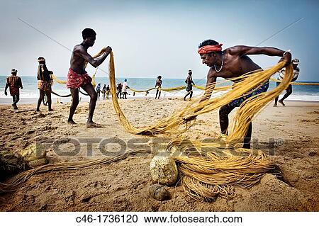 Stock Image - Fichermen, Kovalam Beach, Trivandrum, Thiruvananthapuram, Kerala, India.. Fotosearch