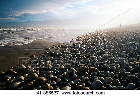 Figure in mist Bluecliffs Beach Waitutu Southland New Zealand View Large Photo Image Stock Photo - Figure in mist Bluecliffs Beach Waitutu Southland New Zealand. Fotosearch