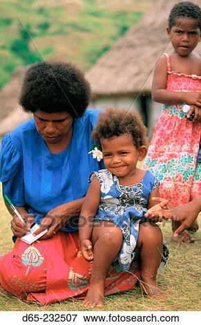 Fijian mother and baby. Navala. Viti Levu. Fiji View Large Photo Image Stock Photo - Fijian mother and baby. Navala. Viti Levu. Fiji. Fotosearch