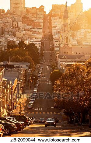 Filbert Street with Saint Peter and Paul Catholic Church at sunset, San Francisco, California, USA View Large Photo Image Picture - Filbert Street with Saint Peter and Paul Catholic Church at sunset, San Francisco, California, USA. Fotosearch
