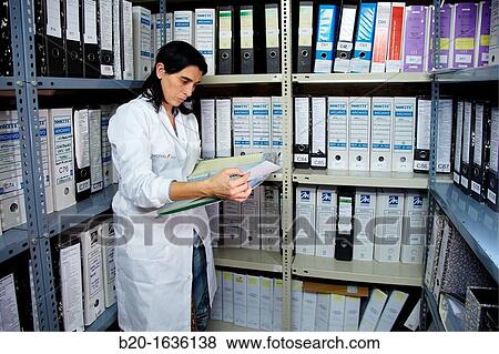 Stock Photo - File documentation of studies completed, Clinical Trials Unit, Testing in Phase 1, the first drug administration in humans. Fotosearch