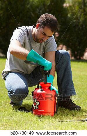 Filling sprayer, garden View Large Photo Image Stock Photo - Filling sprayer, garden. Fotosearch