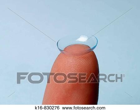 finger with contact lens View Large Photo Image Stock Photograph - finger with contact lens. Fotosearch