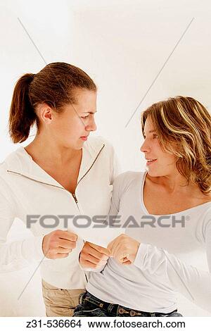 Fiona, Carla, Looking each other, Dispute, Paper View Large Photo Image Picture - Fiona, Carla, Looking each other, Dispute, Paper. Fotosearch