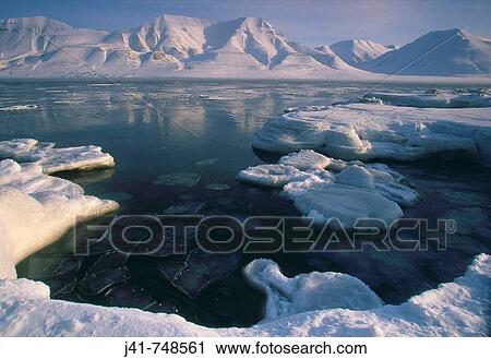 Fiord with icebergs Ny Alesund to Longyearbyen traverse Spitsbergen Island Svalbard Norwegian Arctic View Large Photo Image Stock Image - Fiord with icebergs Ny Alesund to Longyearbyen traverse Spitsbergen Island Svalbard Norwegian Arctic. Fotosearch