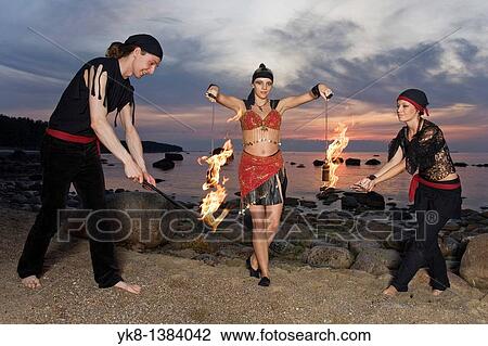 Stock Image - Fire Dancers. Fotosearch