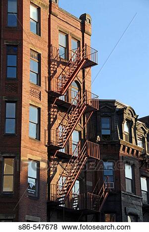 Fire escape, late afternoon sun, on a Boston's Back Bay townhouse. USA. View Large Photo Image Stock Photo - Fire escape, late afternoon sun, on a Boston's Back Bay townhouse. USA.. Fotosearch