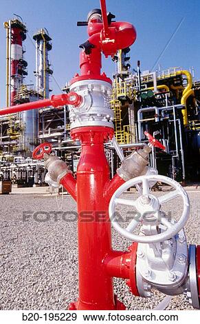 Stock Photo - Fire hydrant. Repsol-YPF oil refinery. Tarragona province. Spain. Fotosearch