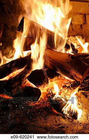 fire in stone or brick fireplace, glowing coals, yellow-white flames all over wood View Large Photo Image Stock Image - fire in stone or brick fireplace, glowing coals, yellow-white flames all over wood. Fotosearch