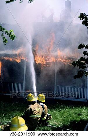 firefighters fighting a house fire in Bowie, Md. View Large Photo Image Stock Image - firefighters fighting a house fire in Bowie, Md.. Fotosearch