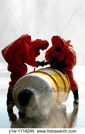 Firefighters fighting againts chemical leak. Cerdanyola del Vall? s, Barcelona province, Spain View Large Photo Image Stock Photography - Firefighters fighting againts chemical leak. Cerdanyola del Vall? s, Barcelona province, Spain. Fotosearch