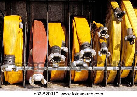 Stock Image - Firehoses on fire truck. Fotosearch