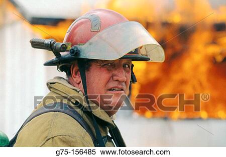 Fireman and burning house View Large Photo Image Stock Photography - Fireman and burning house. Fotosearch