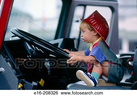 Fireman boy View Large Photo Image Stock Photograph - Fireman boy. Fotosearch