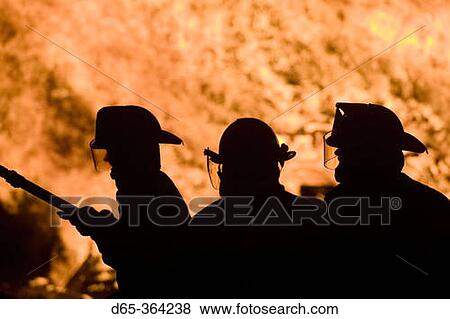 Firemen in silhouette. Rockport fourth of July holiday bonfire. Rockport. Massachusetts. USA. View Large Photo Image Stock Photo - Firemen in silhouette. Rockport fourth of July holiday bonfire. Rockport. Massachusetts. USA.. Fotosearch