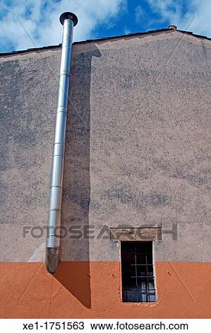 Stock Image - fireplace, window, Sant Hilari Sacalm, Catalonia, Spain. Fotosearch
