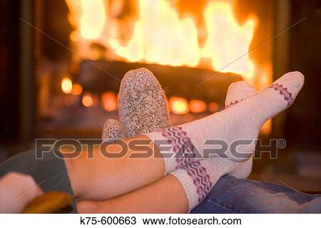 Fireside togetherness View Large Photo Image Stock Image - Fireside togetherness. Fotosearch