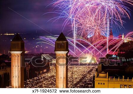 Stock Image - Fireworks at Avinguda Reina Maria Cristina during La Merce Festiva, Barcelona Catalonia Spain. Fotosearch