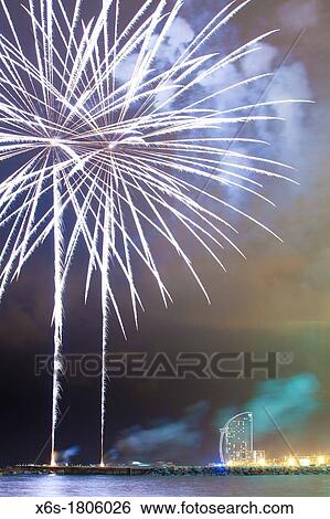 Fireworks at Barceloneta beach during Merce celebrations - Festes de la Merc? -, Barcelona, Spain View Large Photo Image Stock Photograph - Fireworks at Barceloneta beach during Merce celebrations - Festes de la Merc? -, Barcelona, Spain. Fotosearch