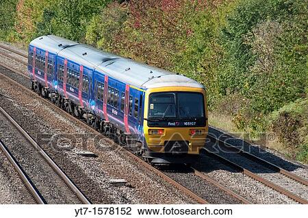 Stock Image - First Great Western class 166 diesel passenger train on mainline at Slough England. Fotosearch