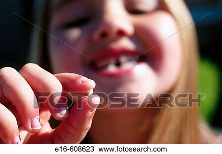 First tooth out View Large Photo Image Stock Image - First tooth out. Fotosearch
