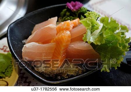 Stock Photograph - Fish fillets for steam boat. Image taken at Taipei, Taiwan.. Fotosearch