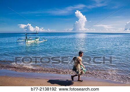fisherman at Lovina Beach, North Coast of Bali, Indonesia. View Large Photo Image Stock Image - fisherman at Lovina Beach, North Coast of Bali, Indonesia.. Fotosearch