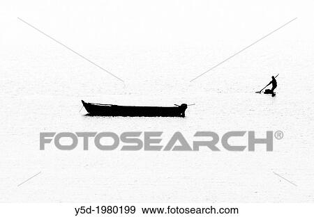 fisherman fishing in a shallow lagoon, Foz do Arelho, Portugal View Large Photo Image Stock Photo - fisherman fishing in a shallow lagoon, Foz do Arelho, Portugal. Fotosearch