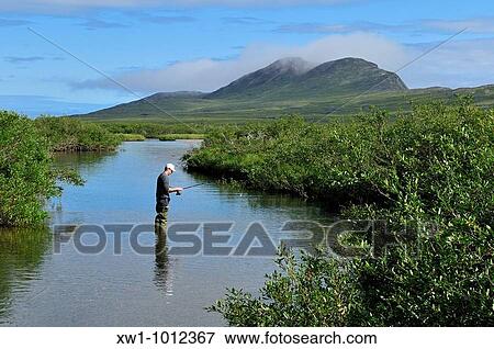 fisherman in a river, tundra valley in the Torngat Mountains National Park, Newfoundland and Labrador, Canada, North America View Large Photo Image Stock Photo - fisherman in a river, tundra valley in the Torngat Mountains National Park, Newfoundland and Labrador, Canada, North America. Fotosearch