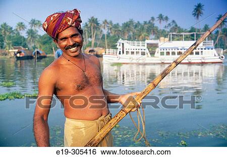 Stock Photograph - Fisherman in Kerala, India. Fotosearch