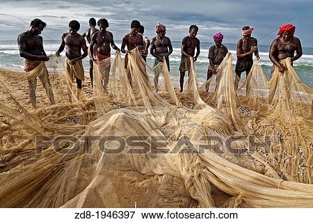 fisherman in kovalam beach. india. View Large Photo Image Stock Photo - fisherman in kovalam beach. india.. Fotosearch
