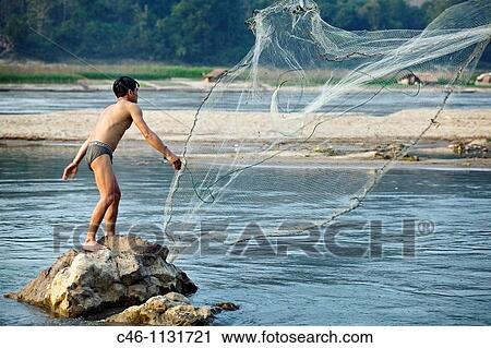 Fisherman. Mekong River. Luang Prabang. Laos. View Large Photo Image Stock Image - Fisherman. Mekong River. Luang Prabang. Laos.. Fotosearch