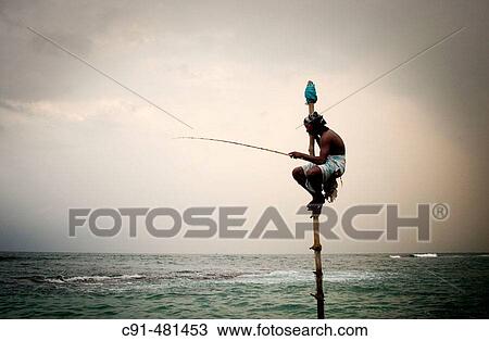 Stock Image - Fisherman. Sri Lanka.. Fotosearch
