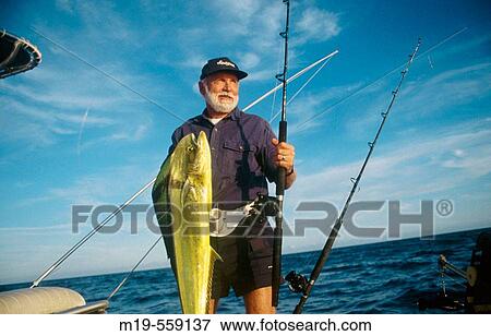 fisherman with his catch View Large Photo Image Stock Photo - fisherman with his catch. Fotosearch