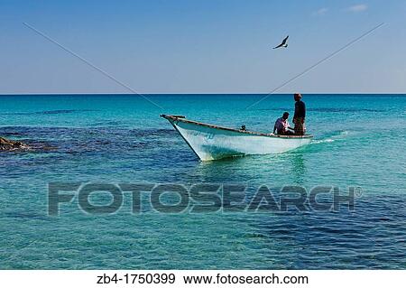 Fishermen, Erher, east coast, Socotra island, listed as World Heritage by UNESCO, Aden Governorate, Yemen, Arabia, West Asia. View Large Photo Image Stock Photo - Fishermen, Erher, east coast, Socotra island, listed as World Heritage by UNESCO, Aden Governorate, Yemen, Arabia, West Asia.. Fotosearch