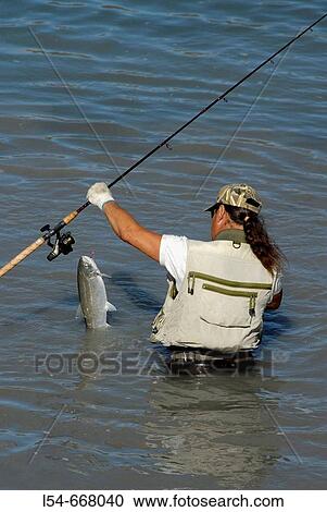Fishermen Fishing for Salmon in Alaska Railroad Ship Creek Fishing Area Downtown Anchorage Alaska AK U S United States View Large Photo Image Stock Image - Fishermen Fishing for Salmon in Alaska Railroad Ship Creek Fishing Area Downtown Anchorage Alaska AK U S United States. Fotosearch