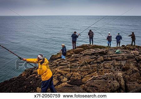 Stock Photo - Fishermen in Baie des Sables menus, AV de la Pierre Longue, Le Croisic, Guerande, Loire Atlantique, France.. Fotosearch
