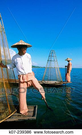Fishermen. Inle lake. Shan state. Myanmar (Burma) View Large Photo Image Stock Photograph - Fishermen. Inle lake. Shan state. Myanmar (Burma). Fotosearch
