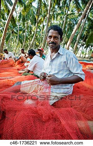 Stock Image - Fishermen, Kochi, Cochin, Kerala, India.. Fotosearch
