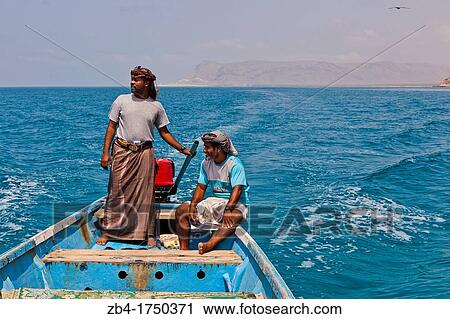 Fishermen on boat, Shouab beach, Qalansiyah, Socotra island, listed as World Heritage by UNESCO, Aden Governorate, Yemen, Arabia, West Asia. View Large Photo Image Stock Image - Fishermen on boat, Shouab beach, Qalansiyah, Socotra island, listed as World Heritage by UNESCO, Aden Governorate, Yemen, Arabia, West Asia.. Fotosearch