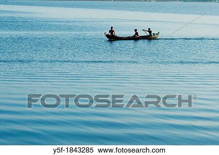 fishermen on rowboat near U Bein bridge at Amarapura View Large Photo Image Stock Photography - fishermen on rowboat near U Bein bridge at Amarapura. Fotosearch